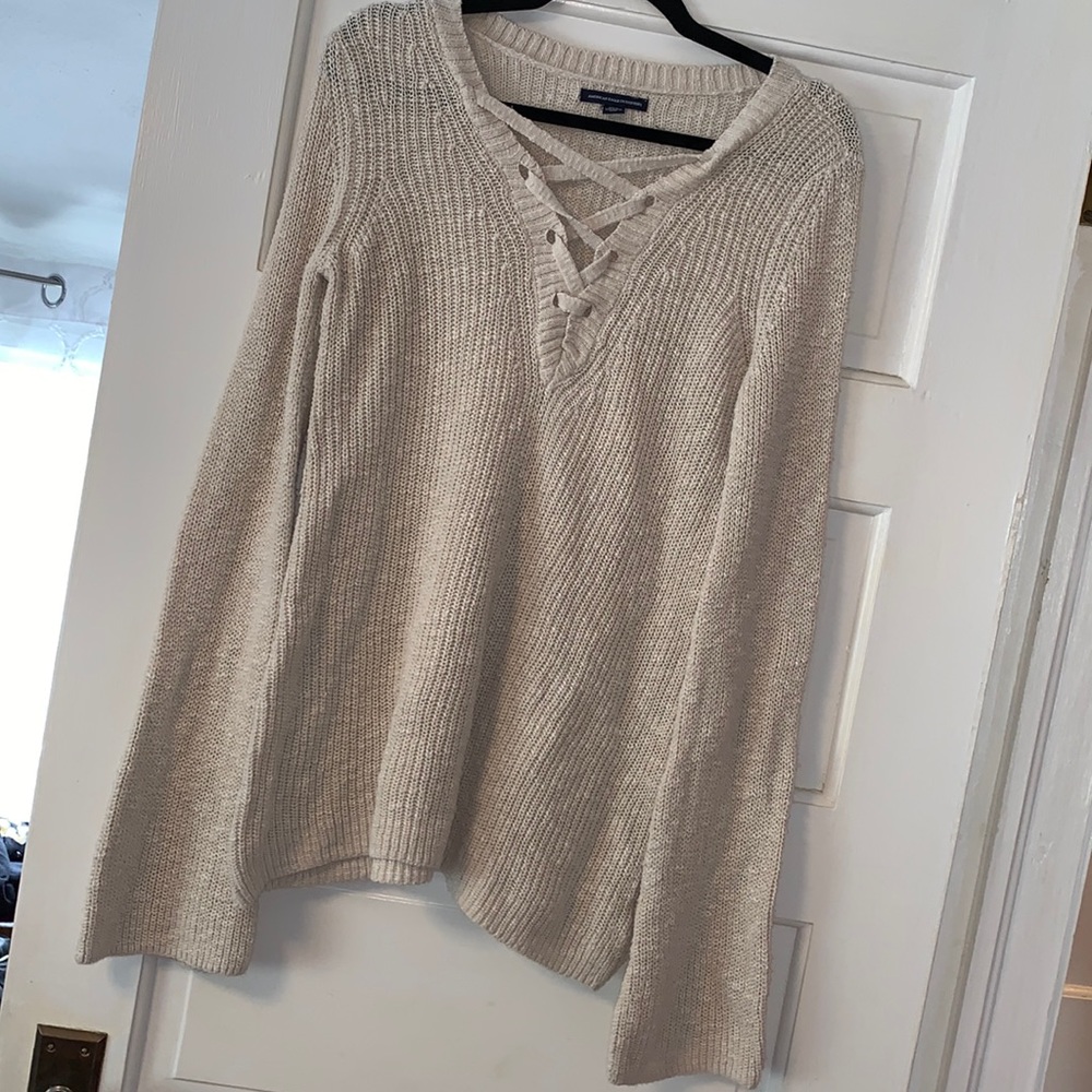 Small American Eagle knit oversized lace up V-neck sweater
